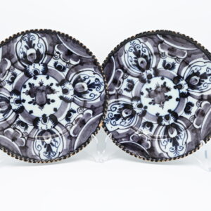 Pair of soft manganese Delftware plates. late 18th century