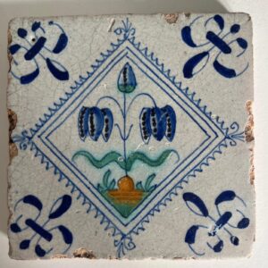 Delft Tile with a chess flower - 17th century