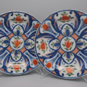 Delft - Pair of 18th century polychrome blue, green and orange plates by 'De Paauw'