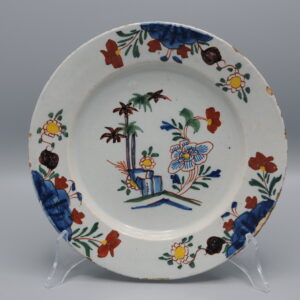 Delft - Delftware plate with polychrome floral decor - mid 18th century