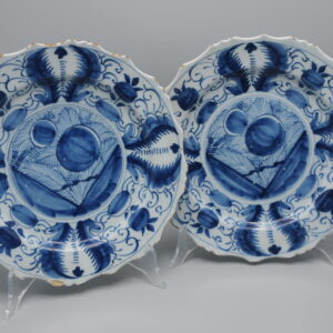 A fine pair of Dutch Delft faience plates with scalloped rim, 18th century