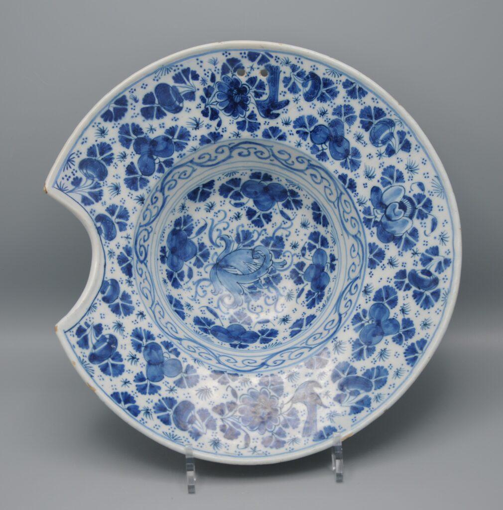 A Barber Bowl in Blue and White Dutch Delftware