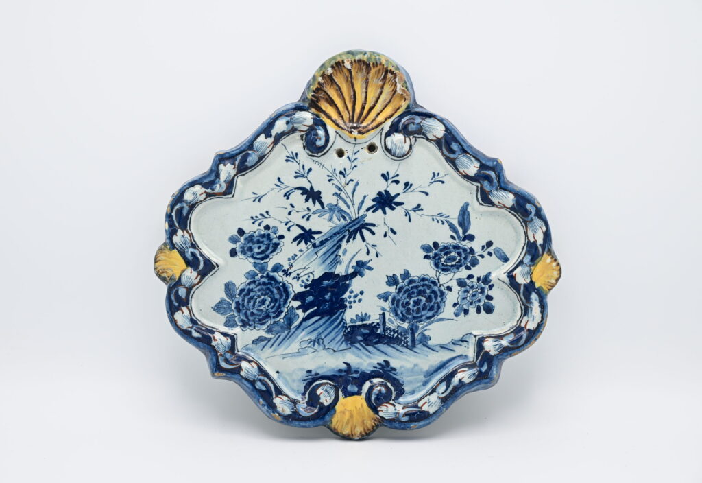 Delft - Blue and White Wall Plaque with polychrome self-frame, mid 18th century
