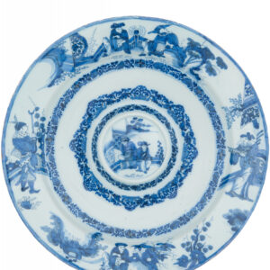 A large Dutch Delftware rosewater dish, painted in cobalt blue on an opaque white tin glaze. The moulded form consists of a shallow central well with a domed centre, surrounded by raised concentric bands and an exaggerated broad rim. The domed central medallion depicts two Chinese figures seated on a garden terrace, with a pavilion and mountainous landscape in the distance. It is surrounded by dense bands of flowering plants, foliate scrollwork and lappet-shaped ornament. The broad rim is painted with four figural scenes showing Chinese dignitaries, scholars and attendants among pierced rocks, pine trees, shrubs and garden fences. The decoration is derived from Chinese Transitional porcelain of the seventeenth century. Rather than following a single porcelain prototype, the Delft painter combined various Asian figures and landscape motifs within a distinctly European form. Rosewater dishes were made to contain rosewater or other scented liquids. These could be used to refresh or cleanse the hands, or to perfume the surrounding air. Their large dimensions, elaborate decoration and association with refined dining customs also made them suitable for prominent display. The reverse is decorated in blue with a repeated pattern of stylised circular motifs separated by vertical lines. Unmarked. The form belongs to a group of large Delft rosewater dishes dating from the final quarter of the seventeenth century. Closely related examples from circa 1675–1680 have been attributed to Samuel van Eenhoorn, owner of De Grieksche A from 1678 until 1686. Without a factory mark, however, an attribution of the present dish remains uncertain. Delft, circa 1680.